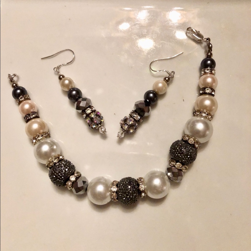 selling a made over beautiful bracelet with earrings to match ; unique set .